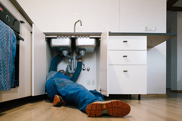 Professional Plumbing technician working in Nassau, DE